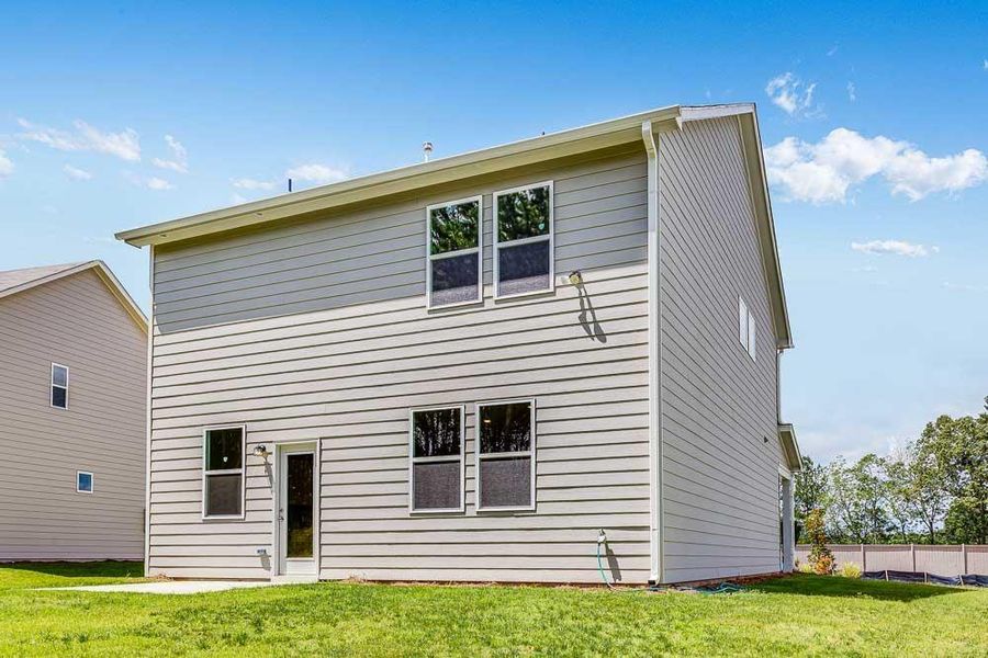 Exterior details and patio area of a home in Heritage River, Euharlee (Image 4).