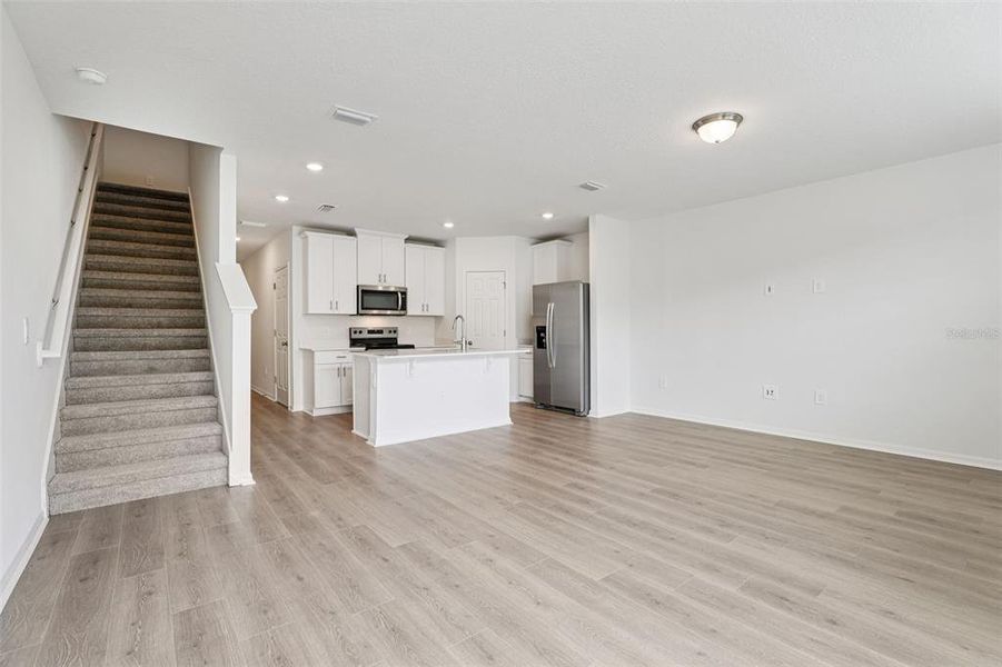 Spacious, unfurnished interior of a new home in Cagan Crossings West, Clermont (Image 28).