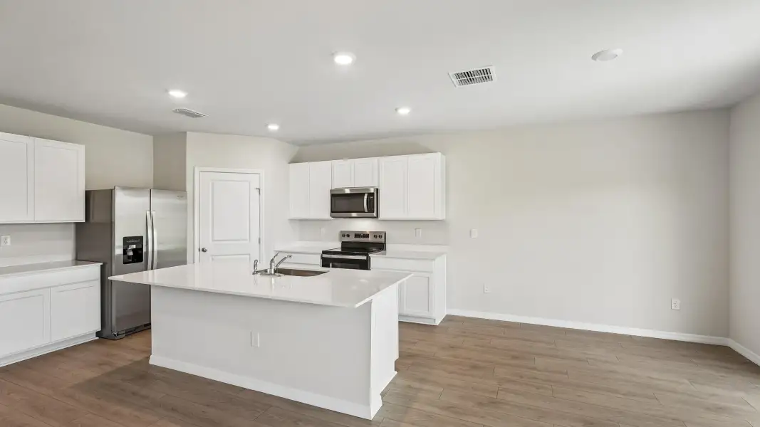 Representative furnished interior of a home built from the Hayden by D.R. Horton in Pinellas County Spot Lots, Pinellas Park (Image 5).