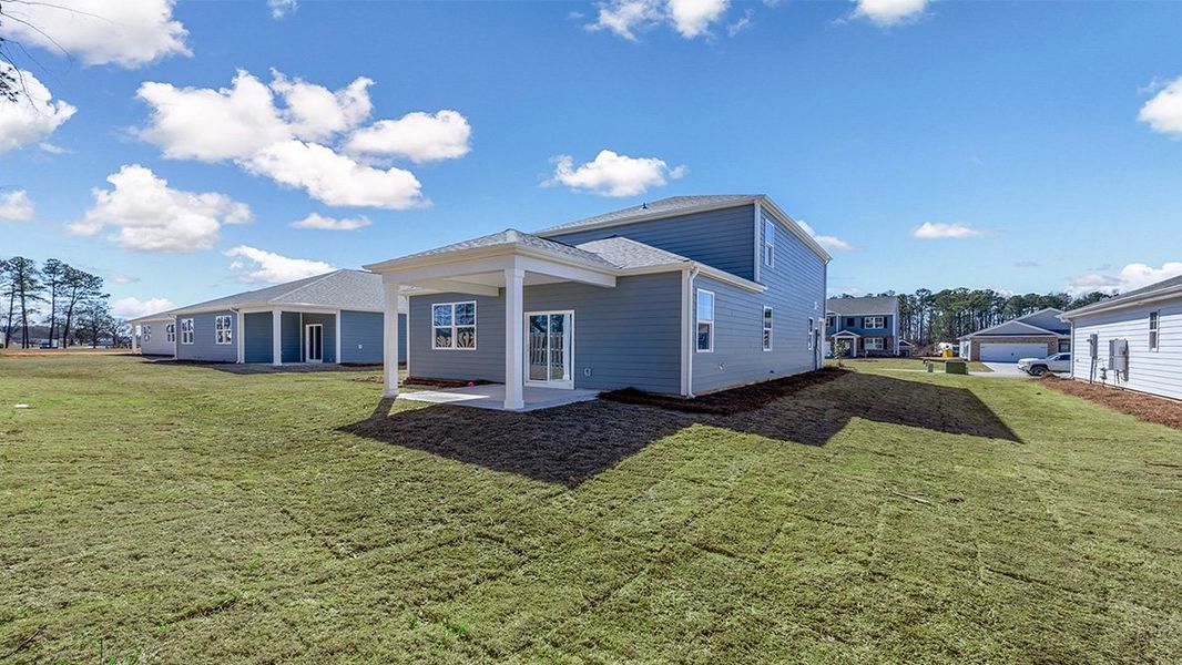 Front exterior of a new home in Sease's Pond, Gilbert, SC, highlighting curb appeal (Image 21).