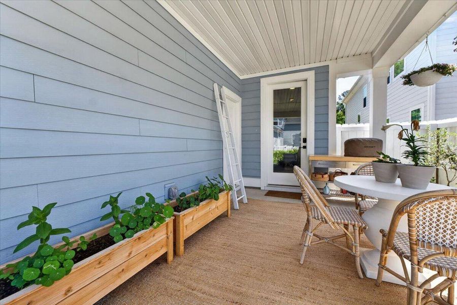 Exterior details and patio area of a home in Oak Bluff, Charleston (Image 31).