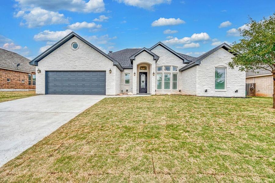Front exterior of a new home in , McGregor, TX, highlighting curb appeal (Image 1). Front exterior of a new home in , McGregor, TX, highlighting curb appeal (Image 1).