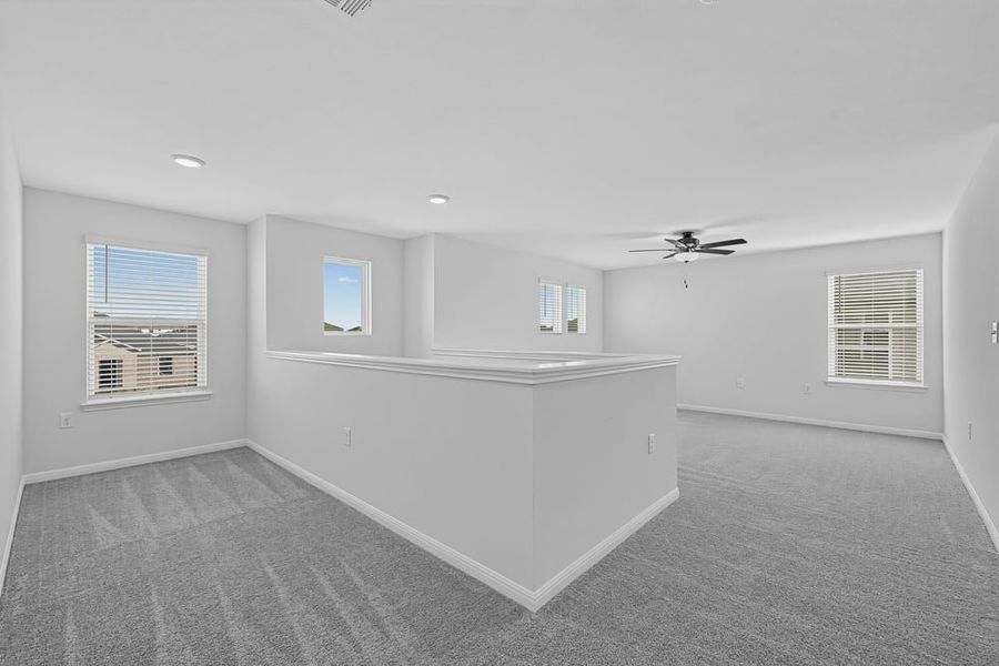 Representative unfurnished interior of a home built from the Warbler by Taylor Morrison in Emory Crossing, Hutto (Image 10).