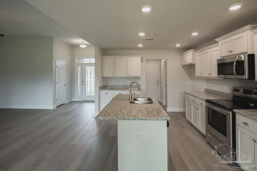 Representative furnished interior of a home built from the Plan 1740 by Adams Homes in Ashton View, Crestview (Image 5). Representative furnished interior of a home built from the Plan 1740 by Adams Homes in Ashton View, Crestview (Image 5).