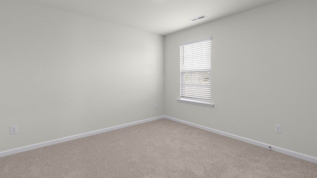 Spacious, unfurnished interior of a new home in The Grove at Matthews Landing, Fuquay Varina (Image 26).