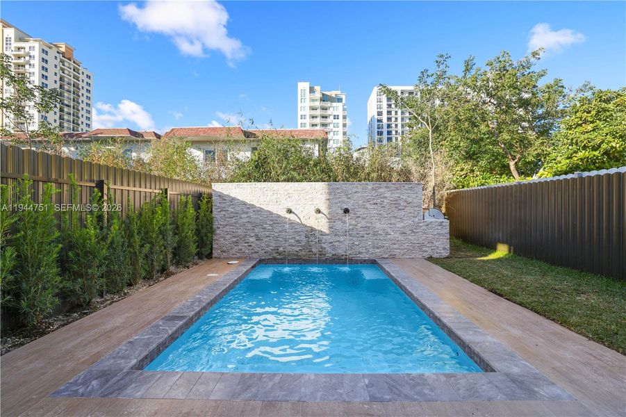 Exterior details and patio area of a home in , Miami (Image 24).