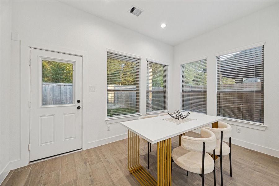 Furnished interior view inside a new home in , Conroe (Image 6).