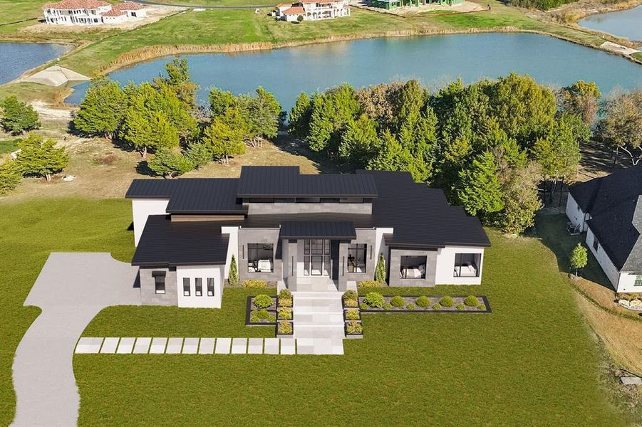 Aerial view of property. Lakefront views.