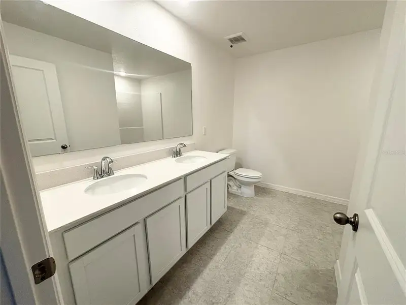 Furnished interior view inside a new home in , Kissimmee (Image 9). Furnished interior view inside a new home in , Kissimmee (Image 9).