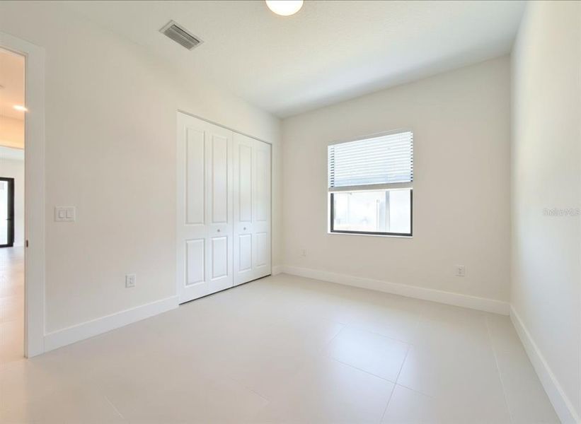 Spacious, unfurnished interior of a new home in , Port Charlotte (Image 42).