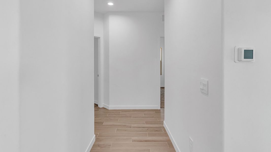 Representative unfurnished interior of a home built from the Parker by D.R. Horton in The Oasis at Rocking K, Vail (Image 30).