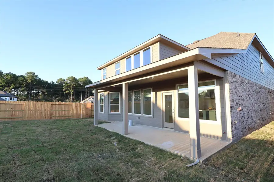 Exterior details and patio area of a home in Sorella, Tomball (Image 11). Exterior details and patio area of a home in Sorella, Tomball (Image 11).