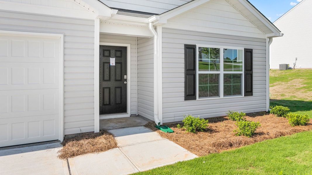 Exterior details and patio area of a home in Madeline Farm, New Bern (Image 17).