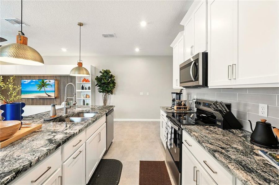 Furnished interior view inside a new home in , Kissimmee (Image 11).