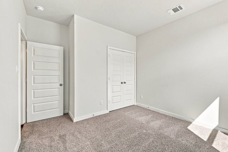 Spacious, unfurnished interior of a new home in The Cottages at Pagosa Springs, Bryan (Image 12).