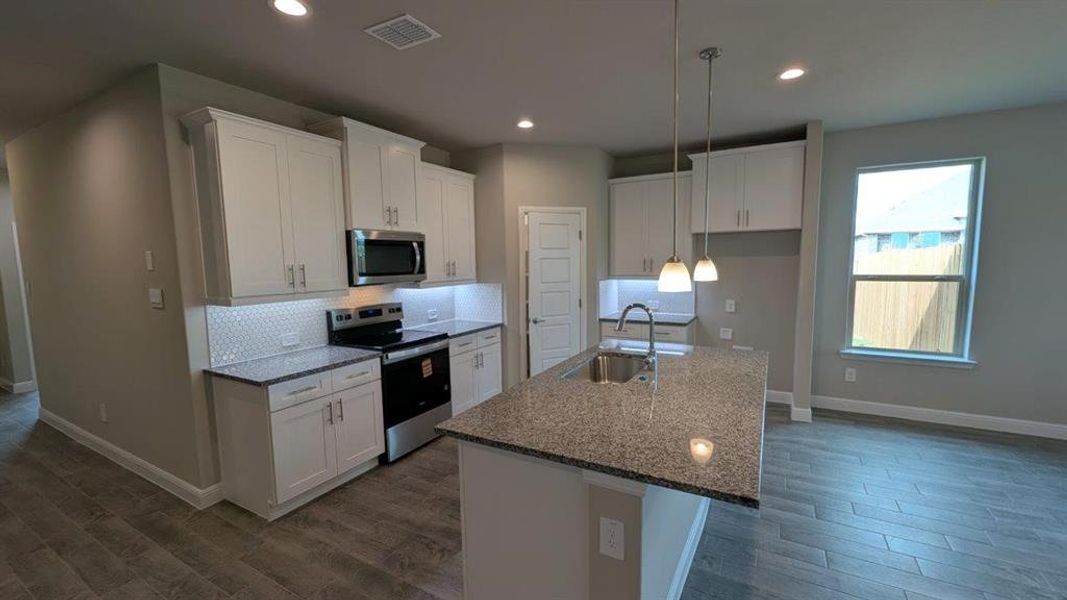 Kitchen - All Home and community information, including pricing, included features, terms, availability and amenities, are subject to change at any time without notice or obligation. All Drawings, pictures, photographs, video, square footages, floor plans, elevations, features, colors and sizes are approximate for illustration purposes only and will vary from the homes as built. Kitchen - All Home and community information, including pricing, included features, terms, availability and amenities, are subject to change at any time without notice or obligation. All Drawings, pictures, photographs, video, square footages, floor plans, elevations, features, colors and sizes are approximate for illustration purposes only and will vary from the homes as built.