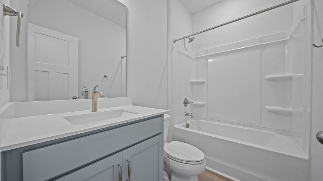 Accomplished full bath designed with both comfort and sophistication in mind Accomplished full bath designed with both comfort and sophistication in mind