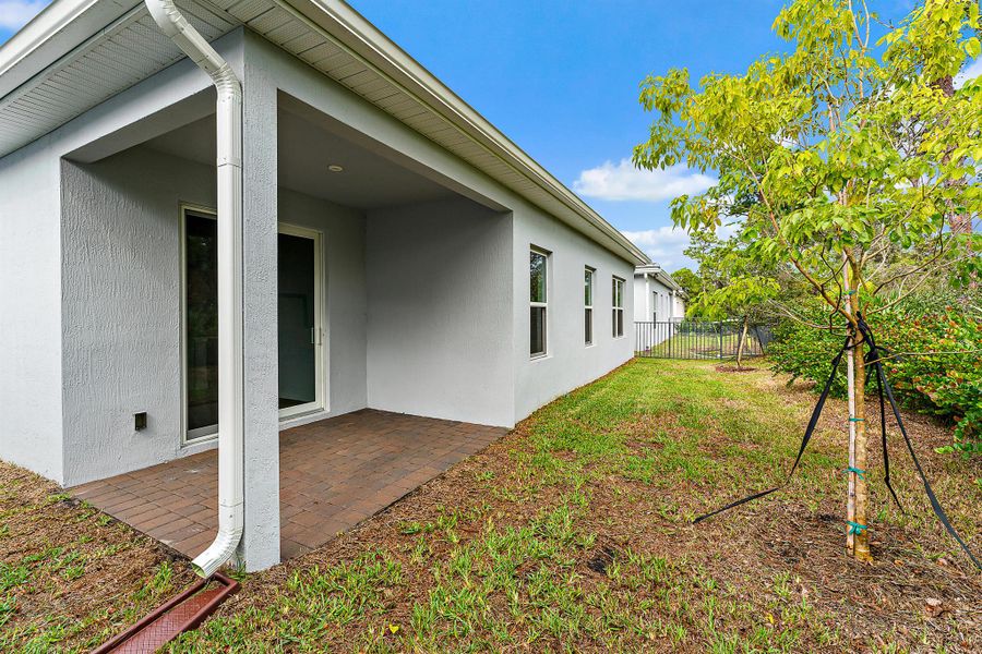 Exterior details and patio area of a home in Banyan Bay, Stuart (Image 39).