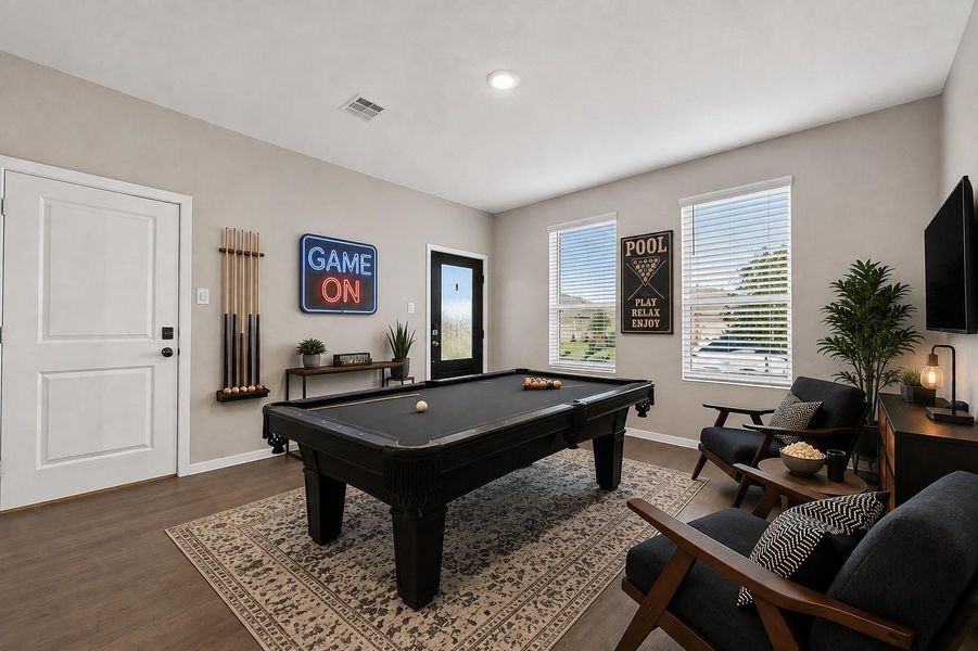 Guest suite virtually staged as a media game room to highlight a spacious recreation area with room for a pool table and seating. Guest suite virtually staged as a media game room to highlight a spacious recreation area with room for a pool table and seating.