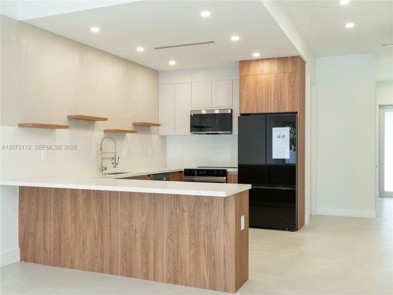 Furnished interior view inside a new home in , Fort Lauderdale (Image 5).