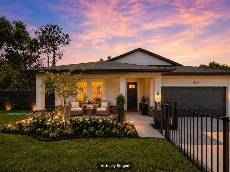 Front exterior of a new home in , Spring Hill, FL, highlighting curb appeal (Image 27).