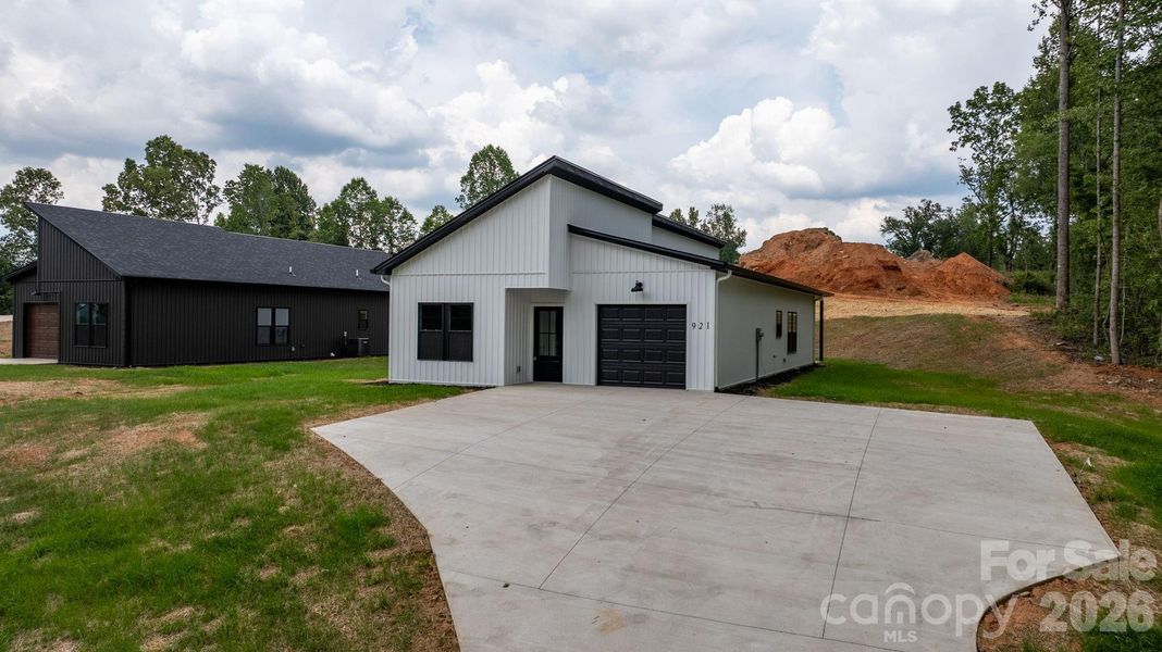 Front exterior of a new home in , Lenoir, NC, highlighting curb appeal (Image 2). Front exterior of a new home in , Lenoir, NC, highlighting curb appeal (Image 2).