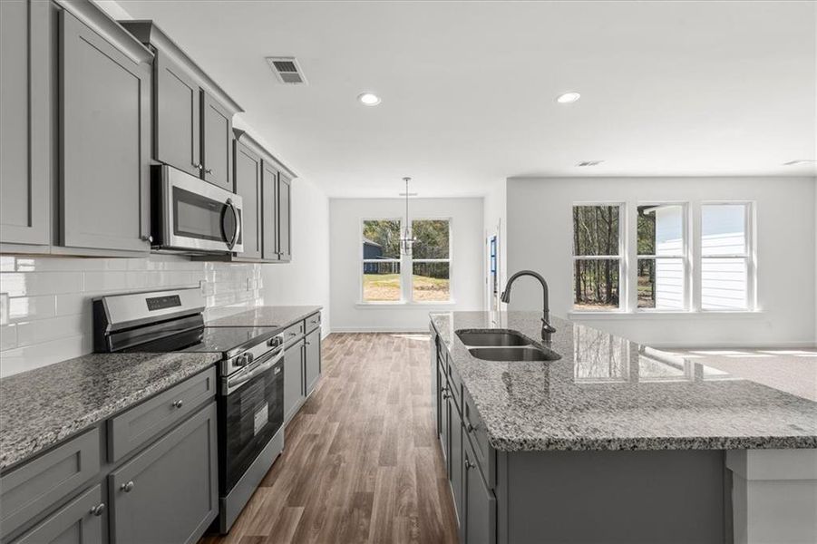 Furnished interior view inside a new home in Ellington Farms, Statham (Image 8).