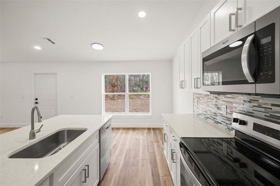 Furnished interior view inside a new home in , Weeki Wachee (Image 10).