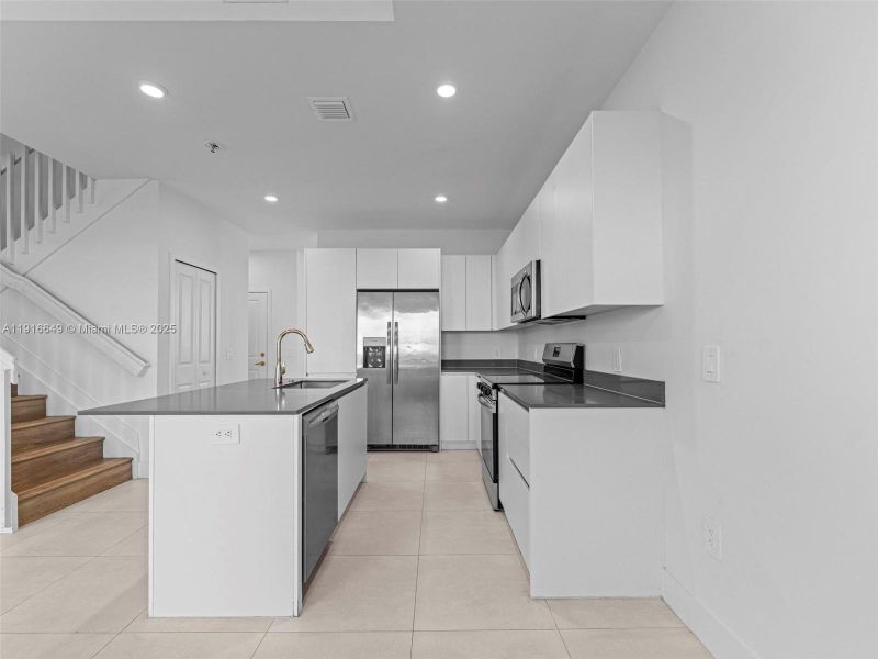 Furnished interior view inside a new home in , Homestead (Image 10). Furnished interior view inside a new home in , Homestead (Image 10).