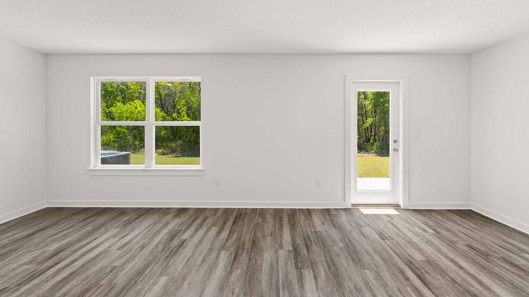 Spacious, unfurnished interior of a new home in Magnolia at the Bluffs Phase 3, Freeport (Image 12).