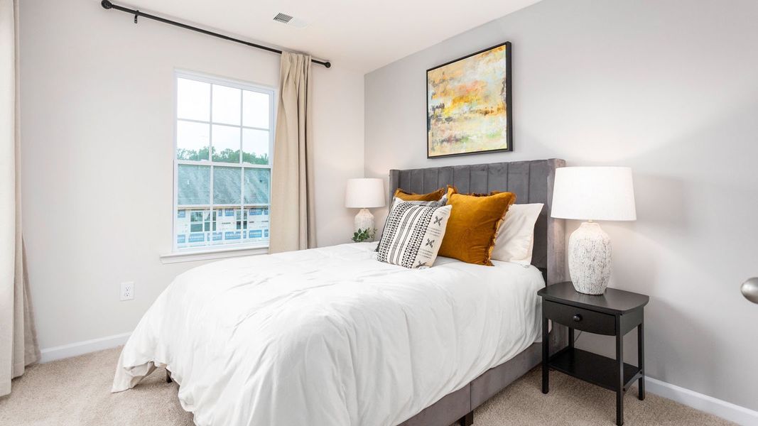 Furnished interior view inside a new home in North Village Townes, Greensboro (Image 16).