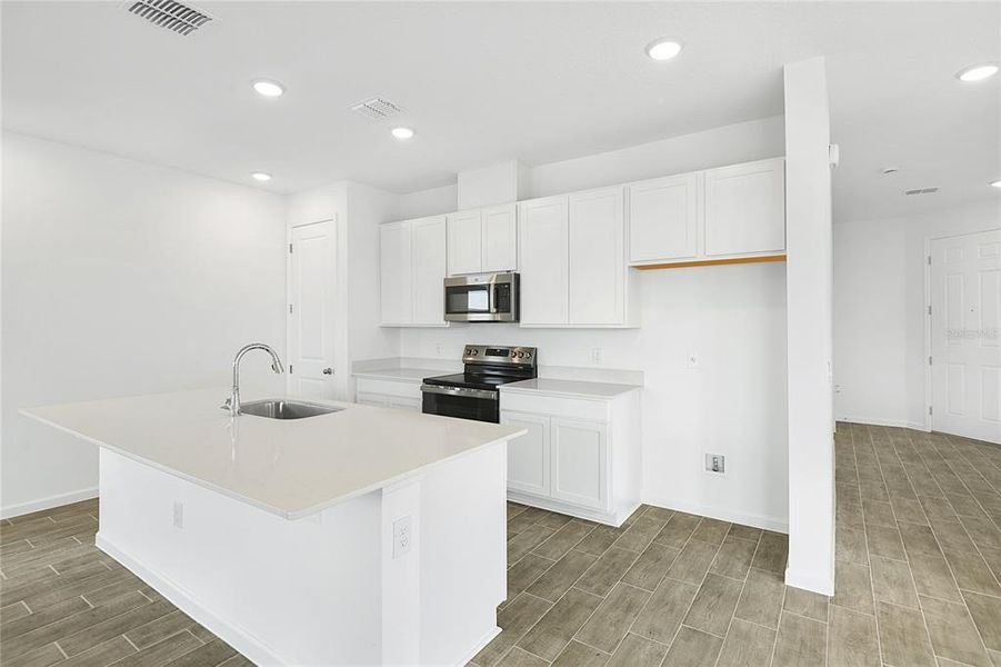 Furnished interior view inside a new home in Seasons at Scenic Terrace, Lake Hamilton (Image 5).
