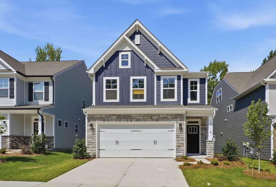 Front exterior of a new home in Caldwell Forest, Charlotte, NC, highlighting curb appeal (Image 1). Front exterior of a new home in Caldwell Forest, Charlotte, NC, highlighting curb appeal (Image 1).
