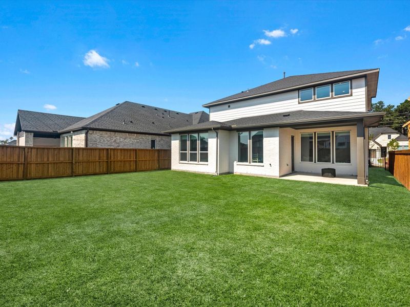 A comfortable backyard with covered outdoor living area A comfortable backyard with covered outdoor living area