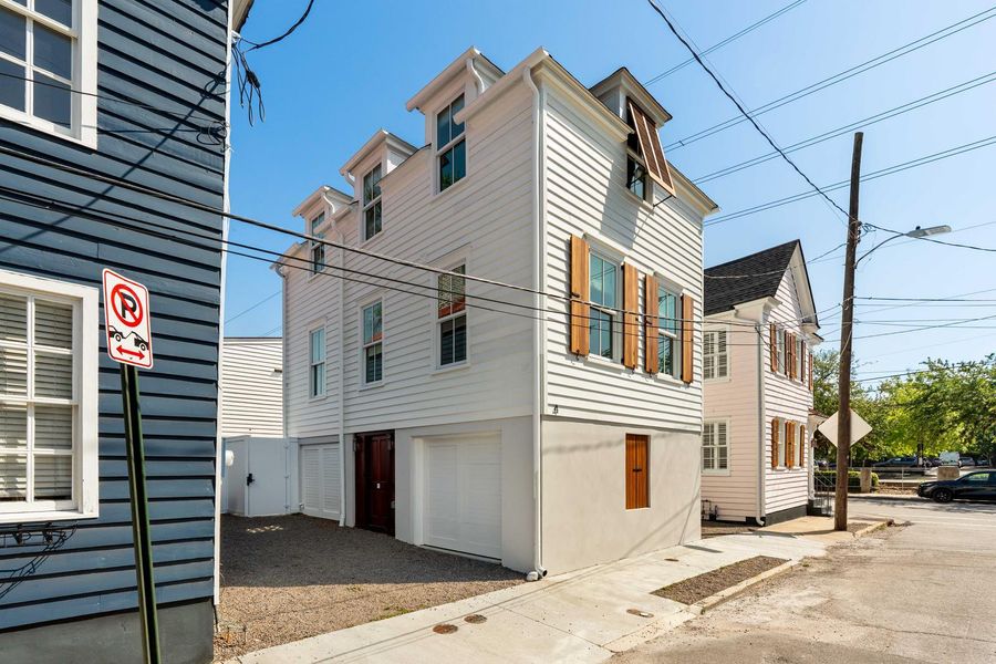 Exterior details and patio area of a home in , Charleston (Image 37).