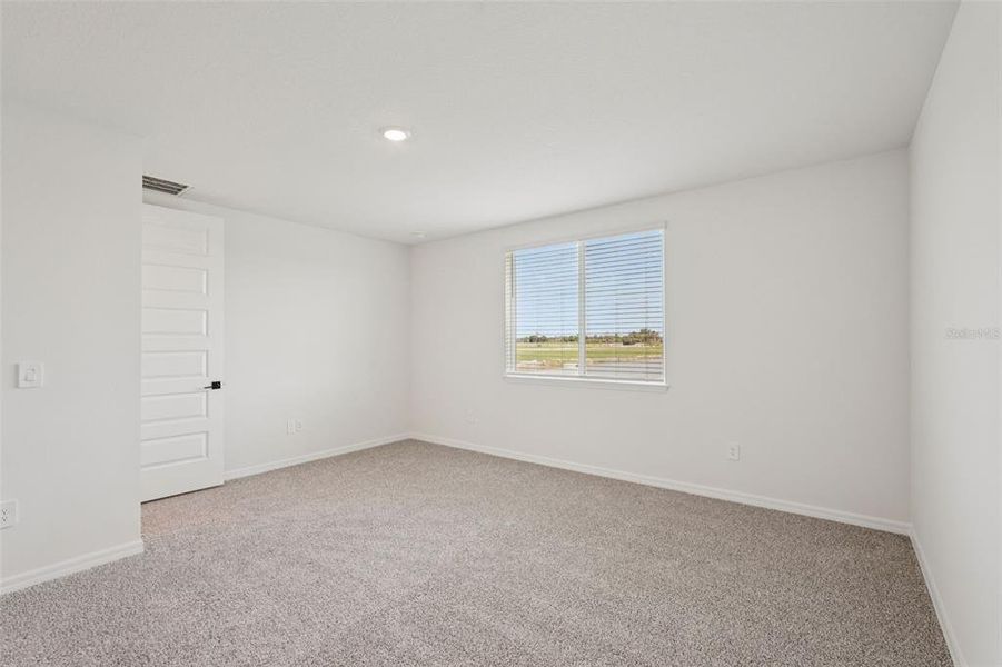 Spacious, unfurnished interior of a new home in Oakfield Trails - Signature Series, Parrish (Image 32).