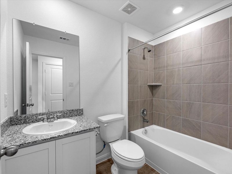Furnished interior view inside a new home in William Trails, Willis (Image 5).