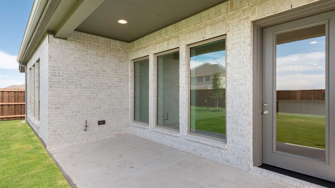 Exterior details and patio area of a home in Meraki, Forney (Image 2). Exterior details and patio area of a home in Meraki, Forney (Image 2).