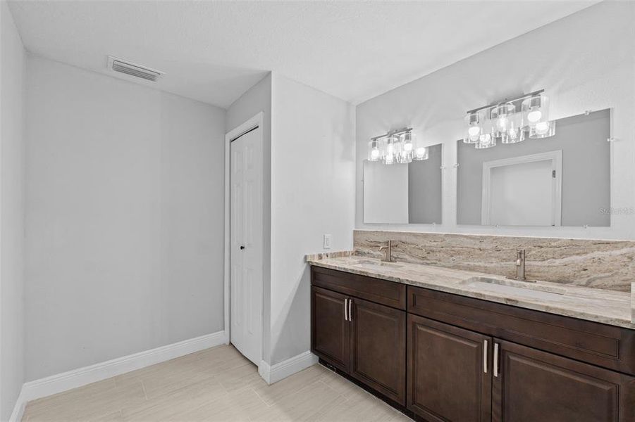 Furnished interior view inside a new home in , Winter Haven (Image 16). Furnished interior view inside a new home in , Winter Haven (Image 16).