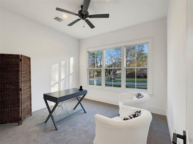 First floor secondary bedroom being shown as a study