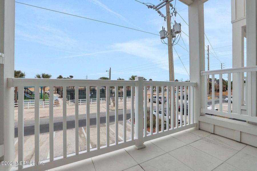 Exterior details and patio area of a home in North Beach Townhomes, Jacksonville Beach (Image 4).