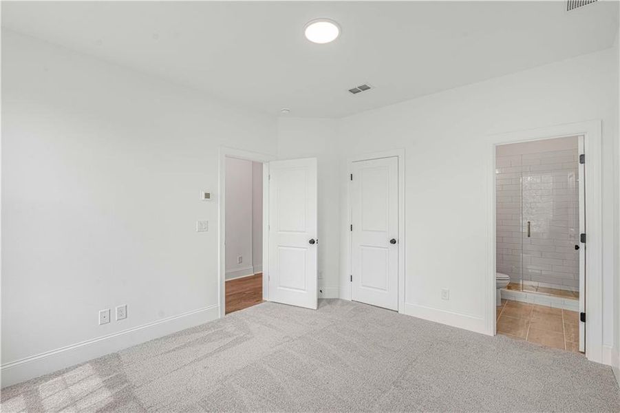 Spacious, unfurnished interior of a new home in Waterhaven, Cumming (Image 42).