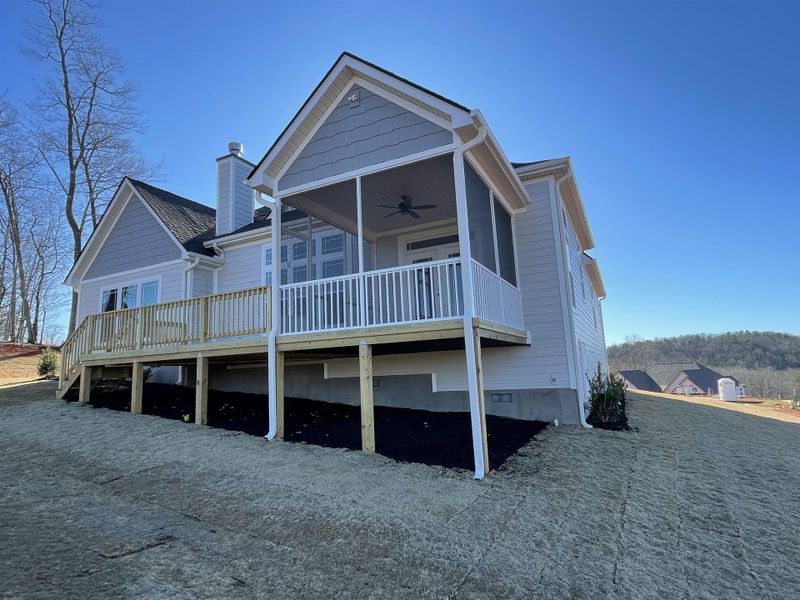 Front exterior of a new home in Pointe Summit, Slater-Marietta, SC, highlighting curb appeal (Image 18).
