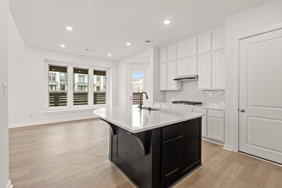 Furnished interior view inside a new home in Bridgeland, Cypress (Image 5).
