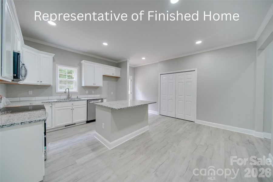 Photo is a similar build. Plan and features may vary.