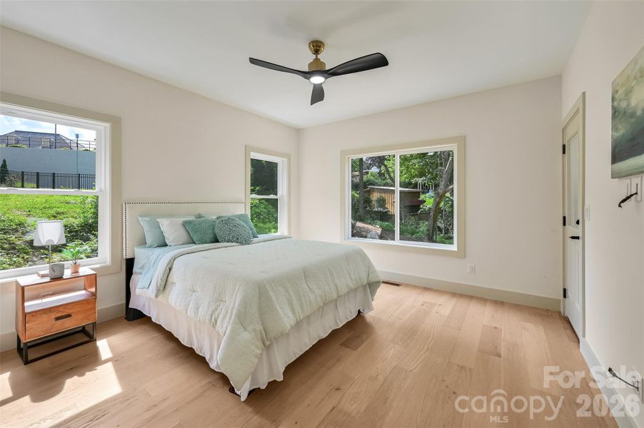 abundant light in basement bedroom with deck access