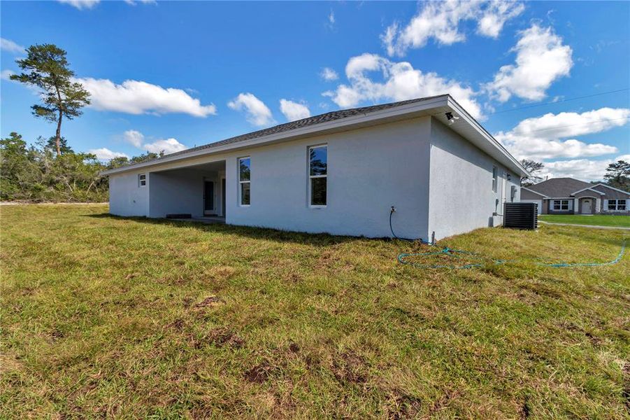Exterior details and patio area of a home in , Ocala (Image 34).