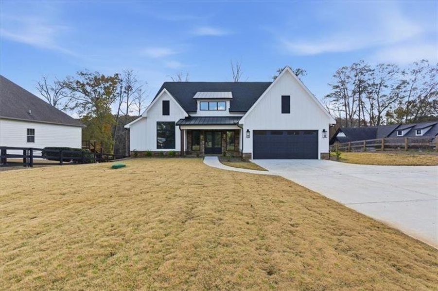 Front exterior of a new home in , Cartersville, GA, highlighting curb appeal (Image 25). Front exterior of a new home in , Cartersville, GA, highlighting curb appeal (Image 25).