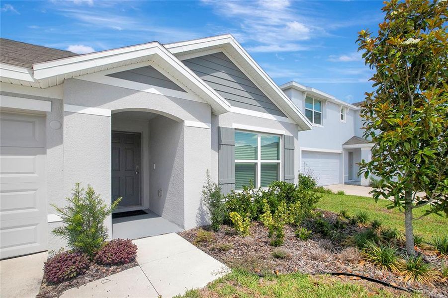 Front exterior of a new home in River Park, Temple Terrace, FL, highlighting curb appeal (Image 25).