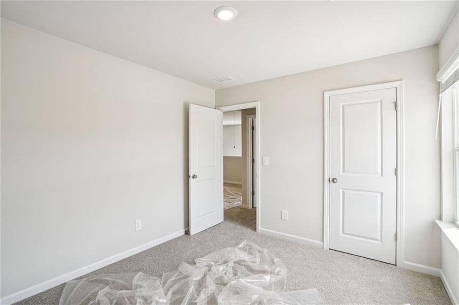 Spacious, unfurnished interior of a new home in Hawthorne Station, College Park (Image 19). Spacious, unfurnished interior of a new home in Hawthorne Station, College Park (Image 19).